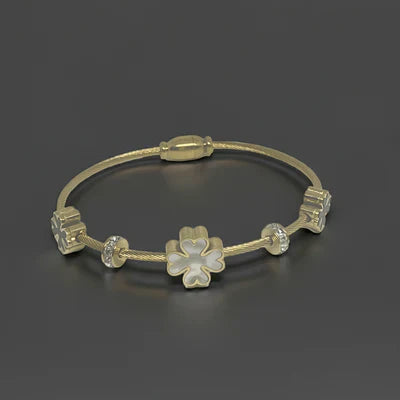 Elegant personalized jewelry Newfoundland Labrador bracelet with floral design and unique charms.