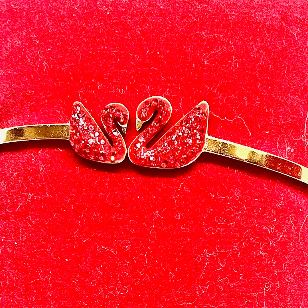 16k gold plated swan braceket