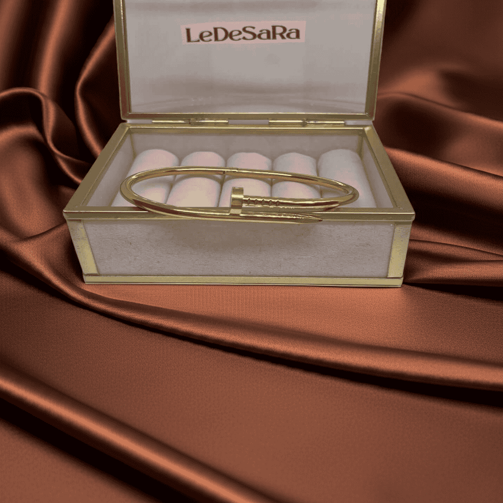 18k Gold Nail design bracelet in a LeDeSaRa box on brown satin fabric