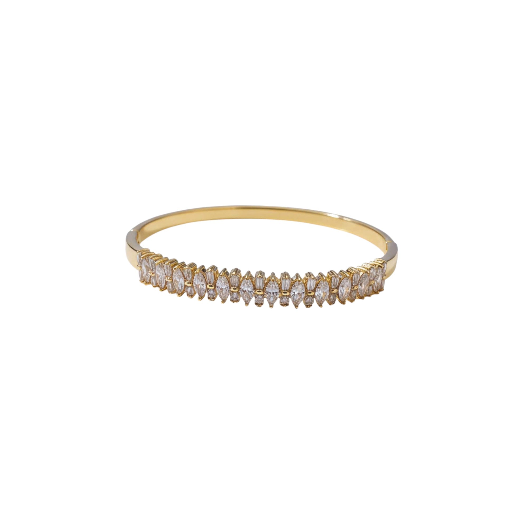 Gold bracelet with clear stones on a white background