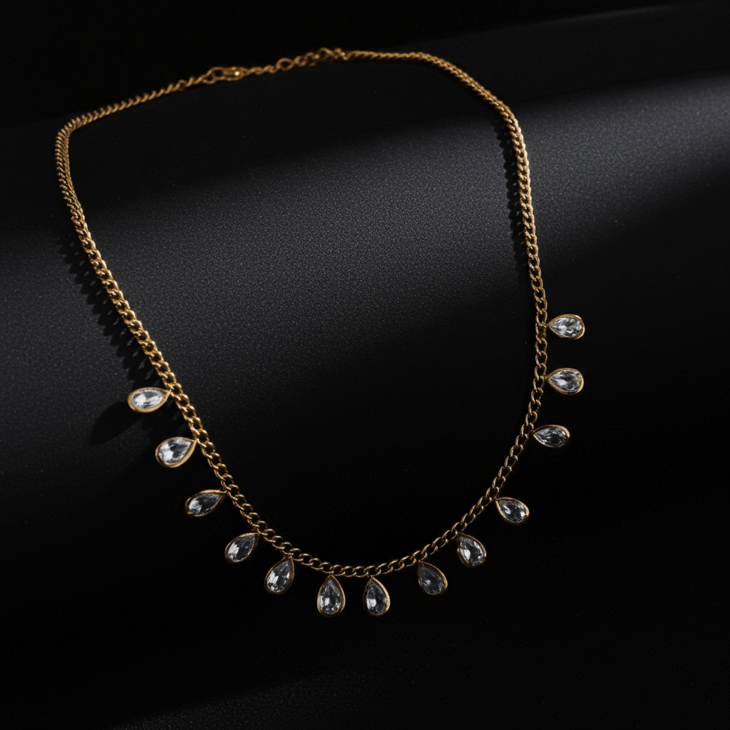 Buy now Cubic Zirconia Gold necklace with teardrop-shaped crystals on a black background deal by LeDeSaRa.