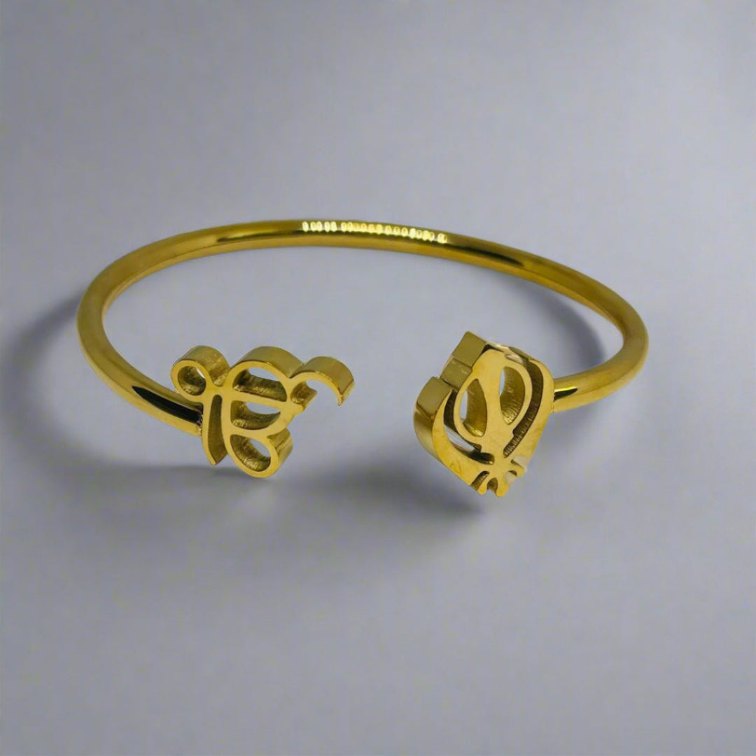 Gold-plated bracelet with Ek Onkar Khanda symbol on a white background