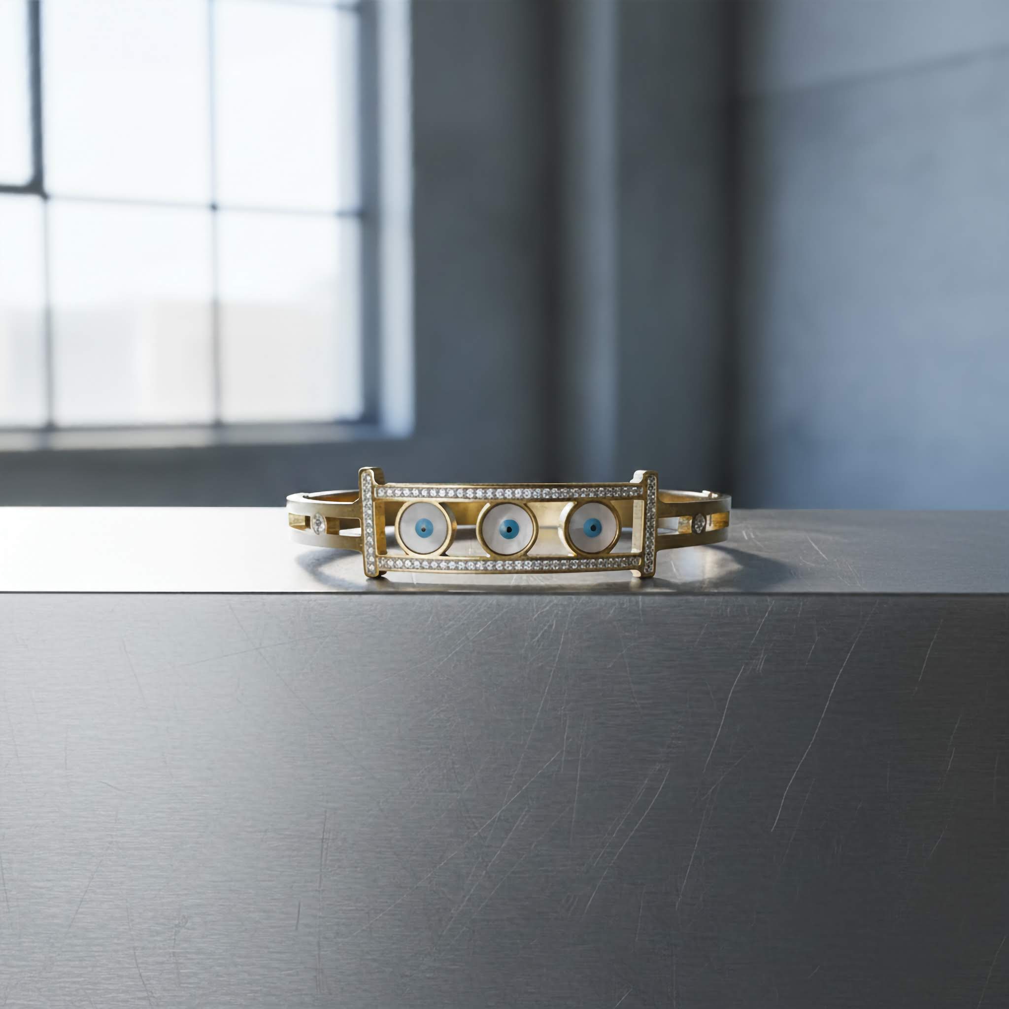 Evil eye Gold plated bracelet on a dark surface