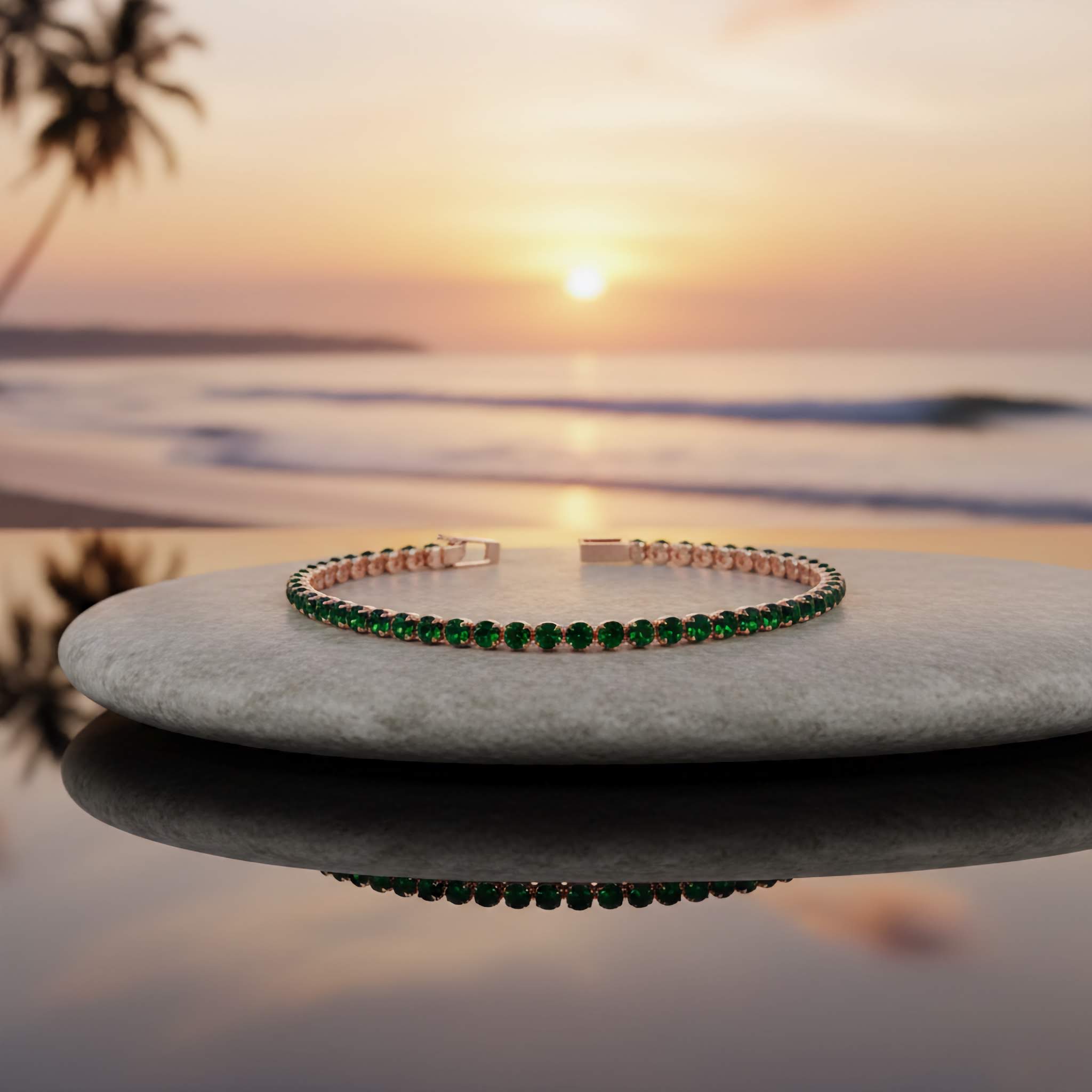 Green bracelet on a stone with a sunset beach background