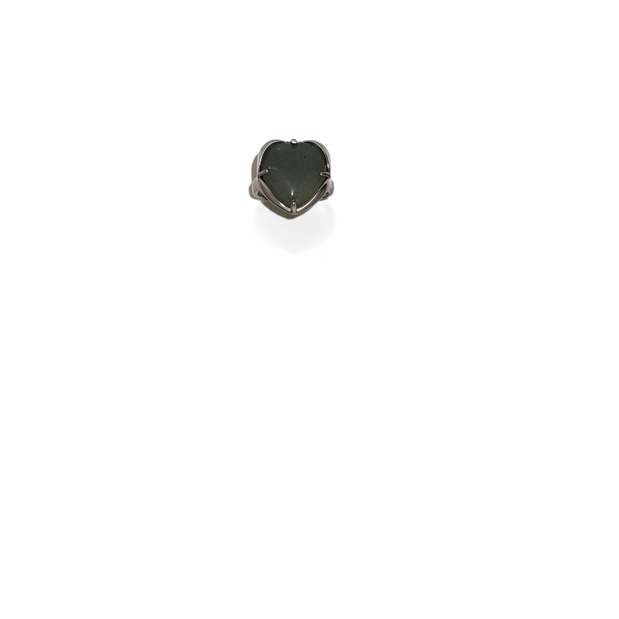 Heart-shaped dark green stone pendant on a white background