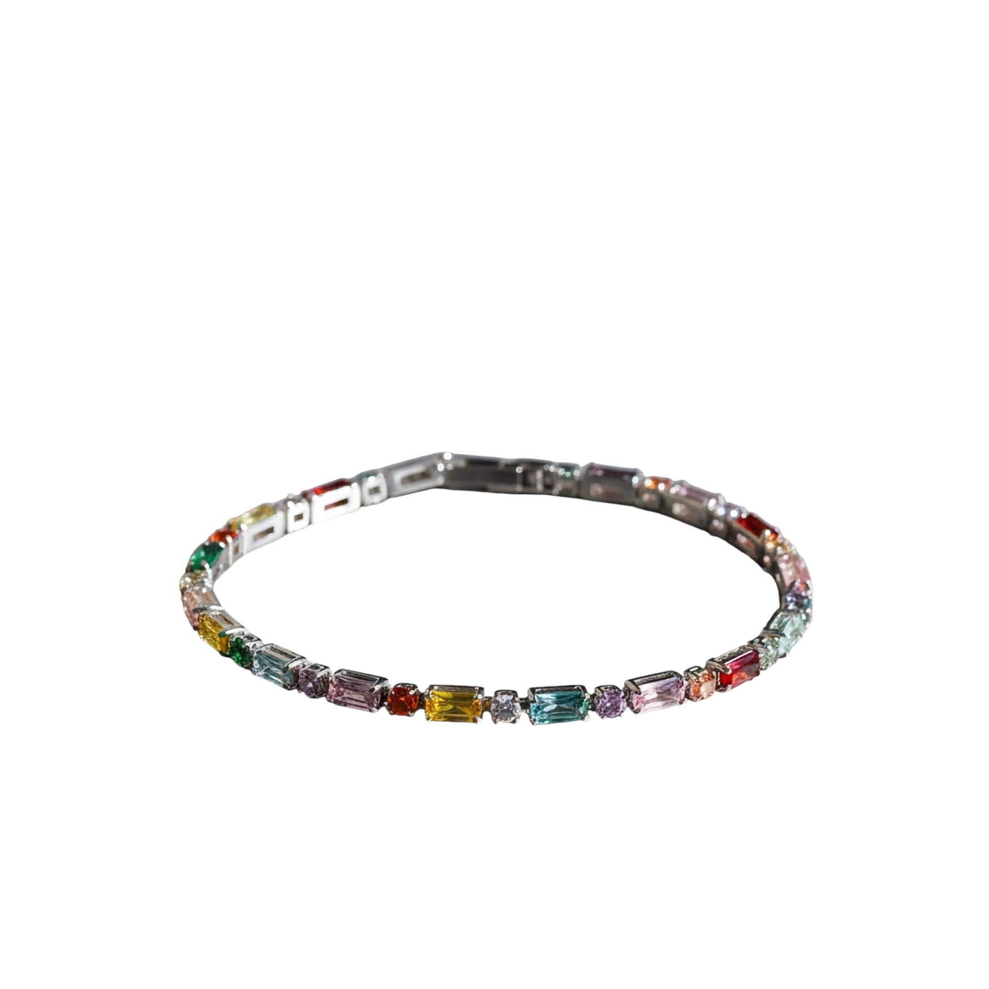 Multicolored gemstone tennis bracelet on a white background