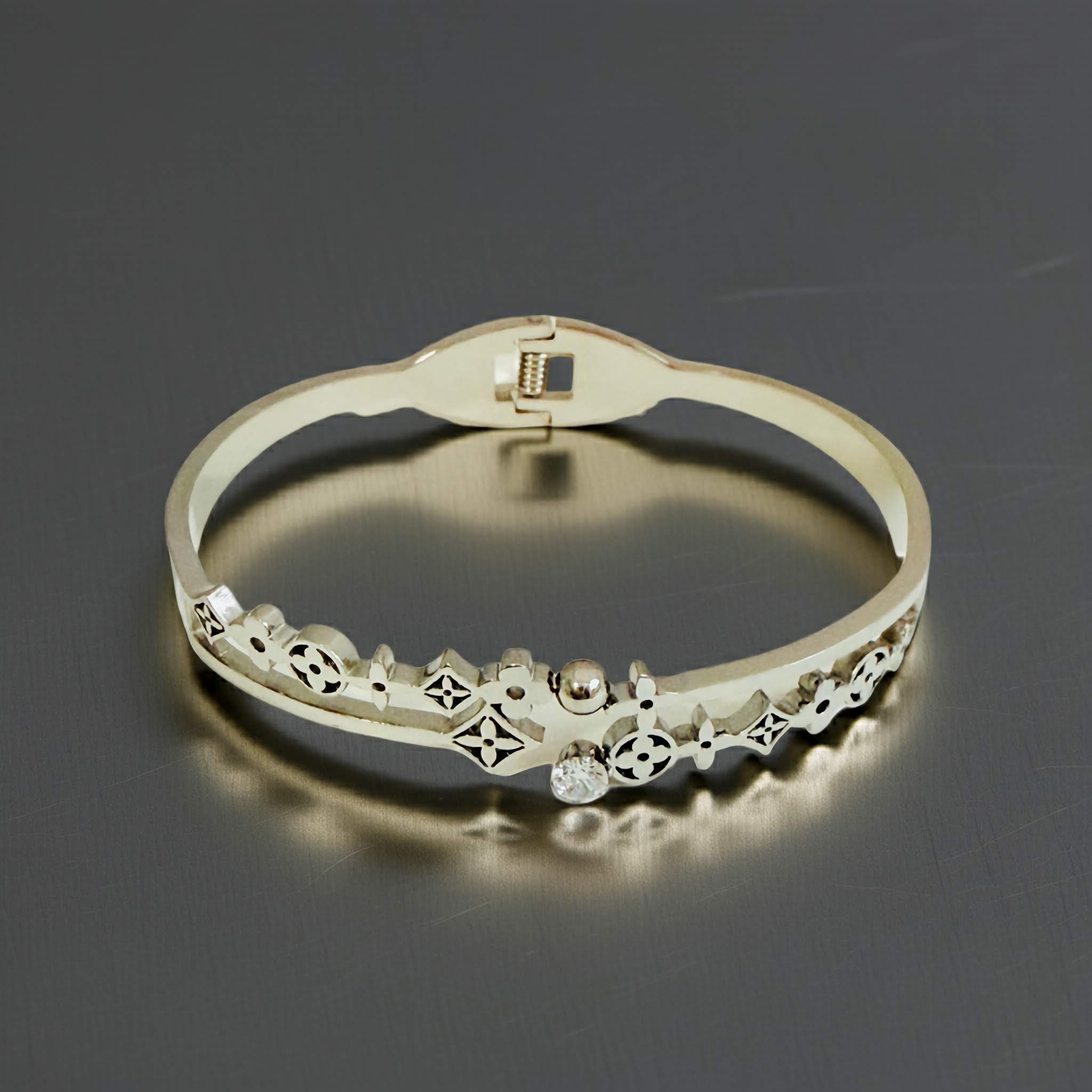 Oxidized Silver bracelet with intricate designs on a dark background