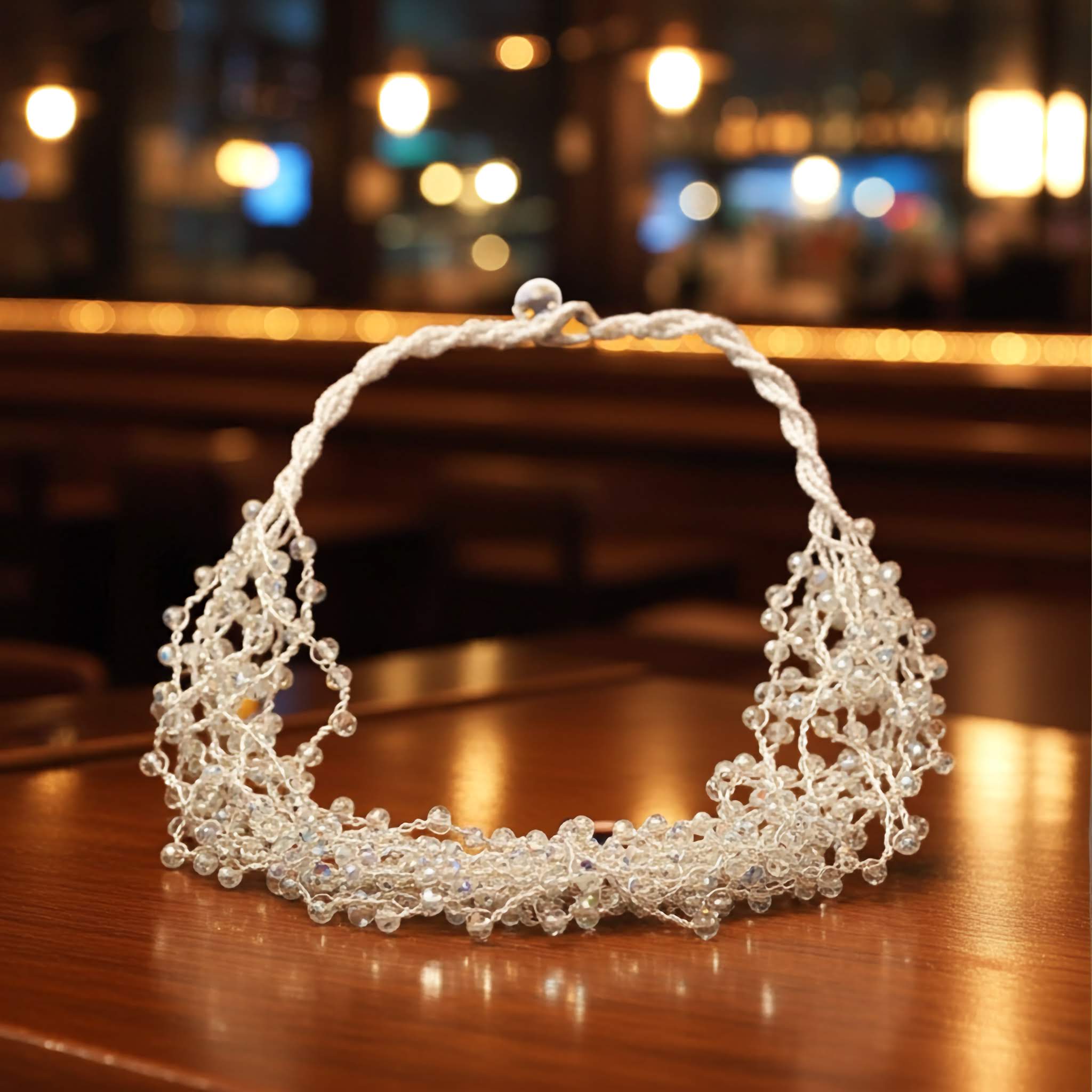 beaded Necklace on a wooden surface with a blurred background