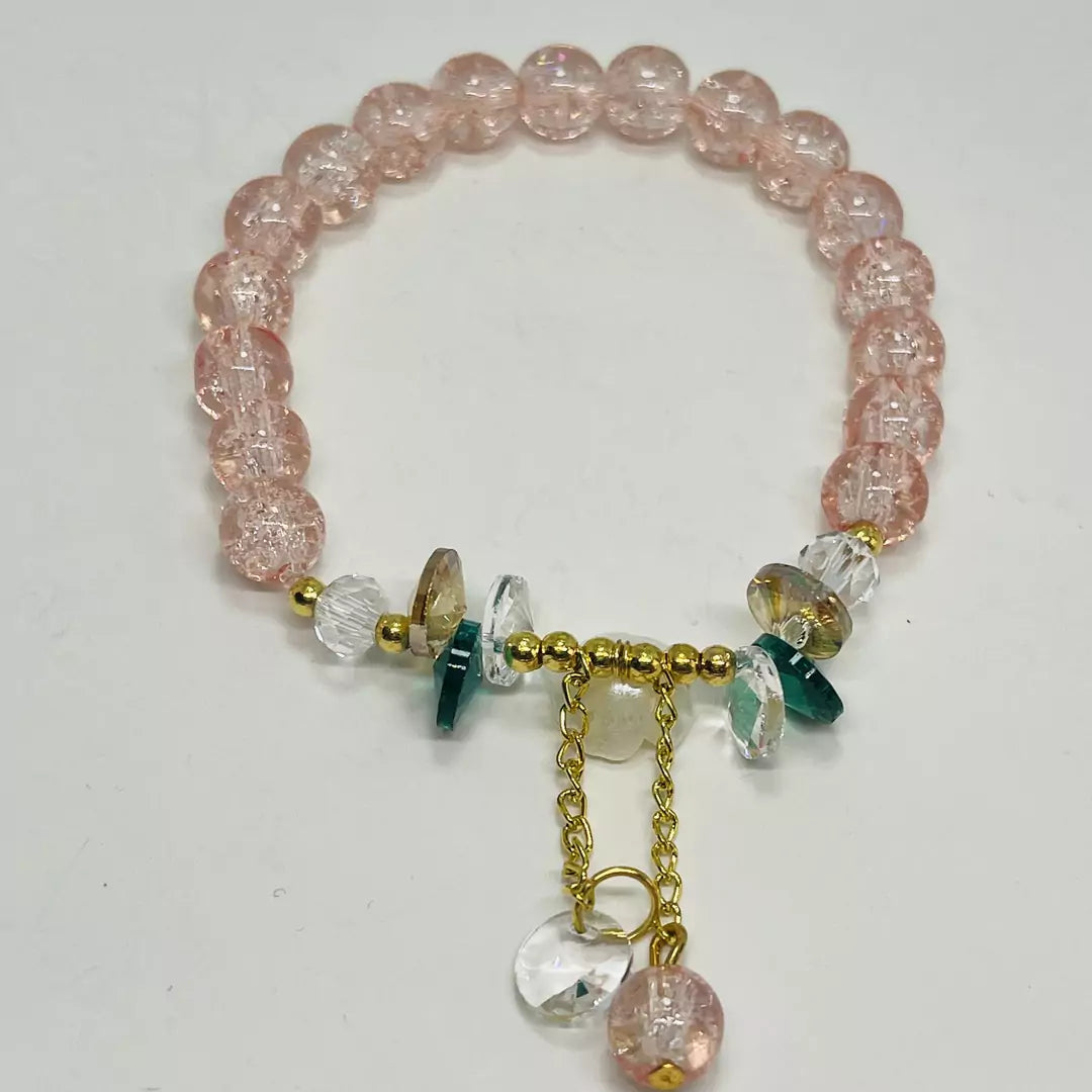 Shop pink Glass Beads Bracelets with Charms