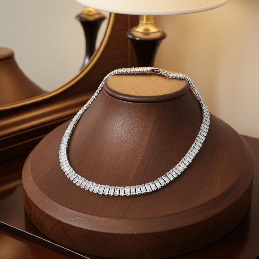 Swarovski crystal Silver necklace on a wooden stand with a blurred background