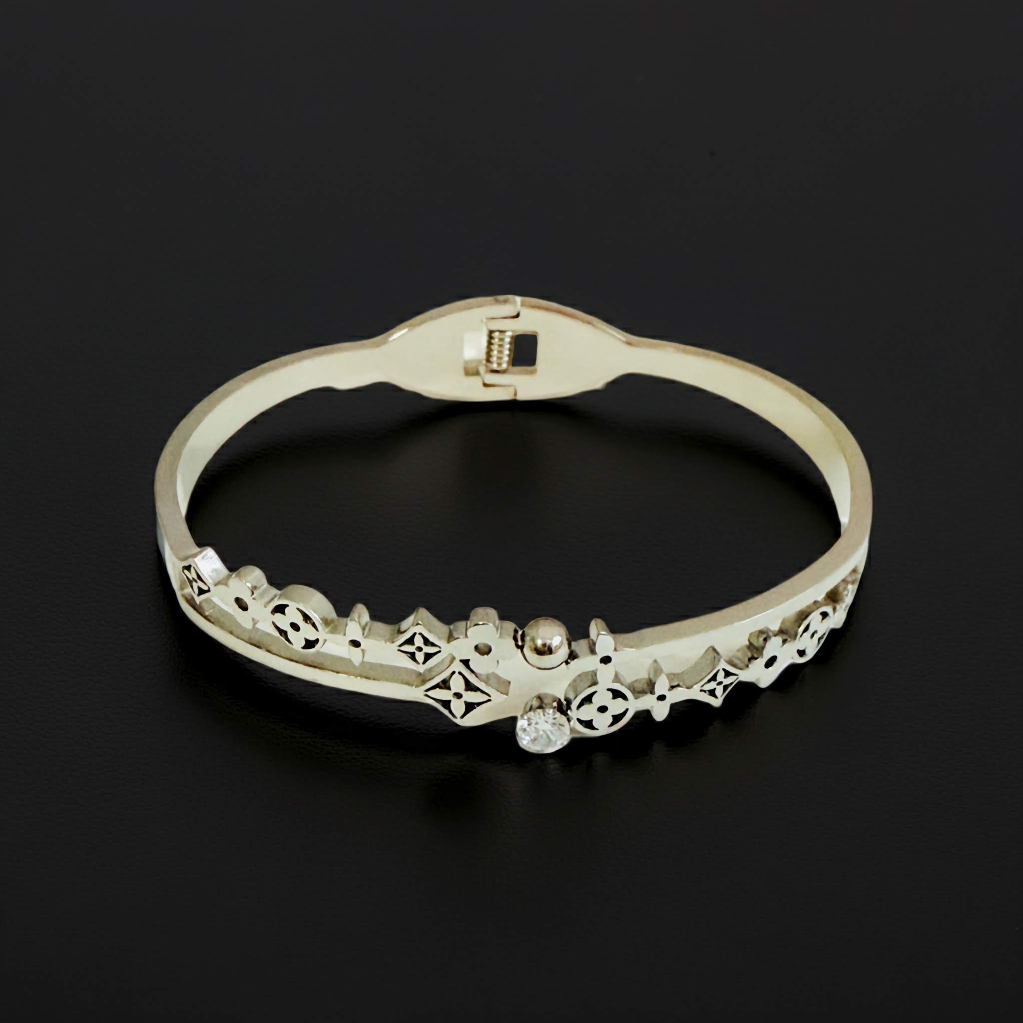 Oxidized Silver bracelet with intricate designs on a black background