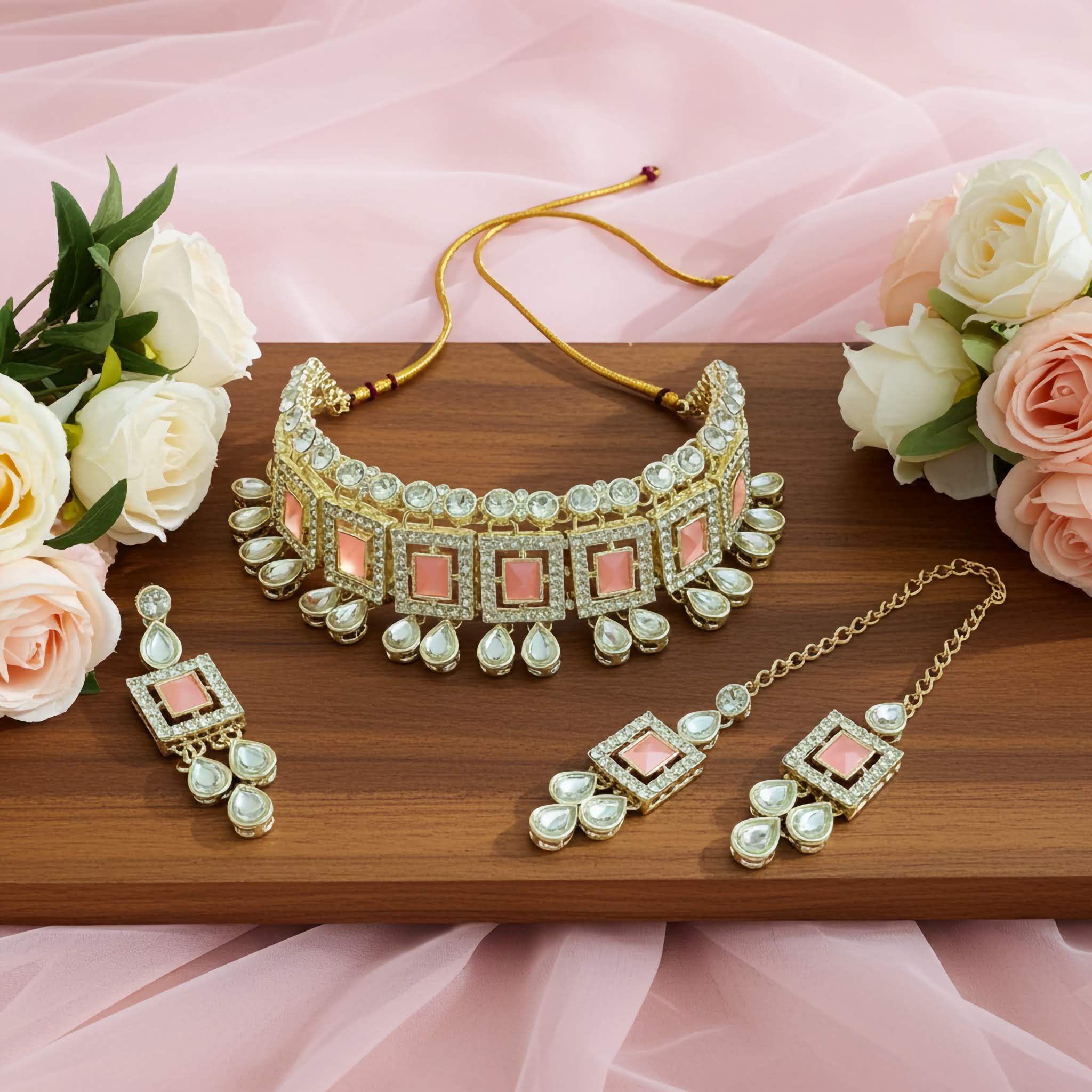 LeDeSaRa offers silver & pink color choker necklace Jewelry set with necklace and earrings on a wooden board with flowers in the background