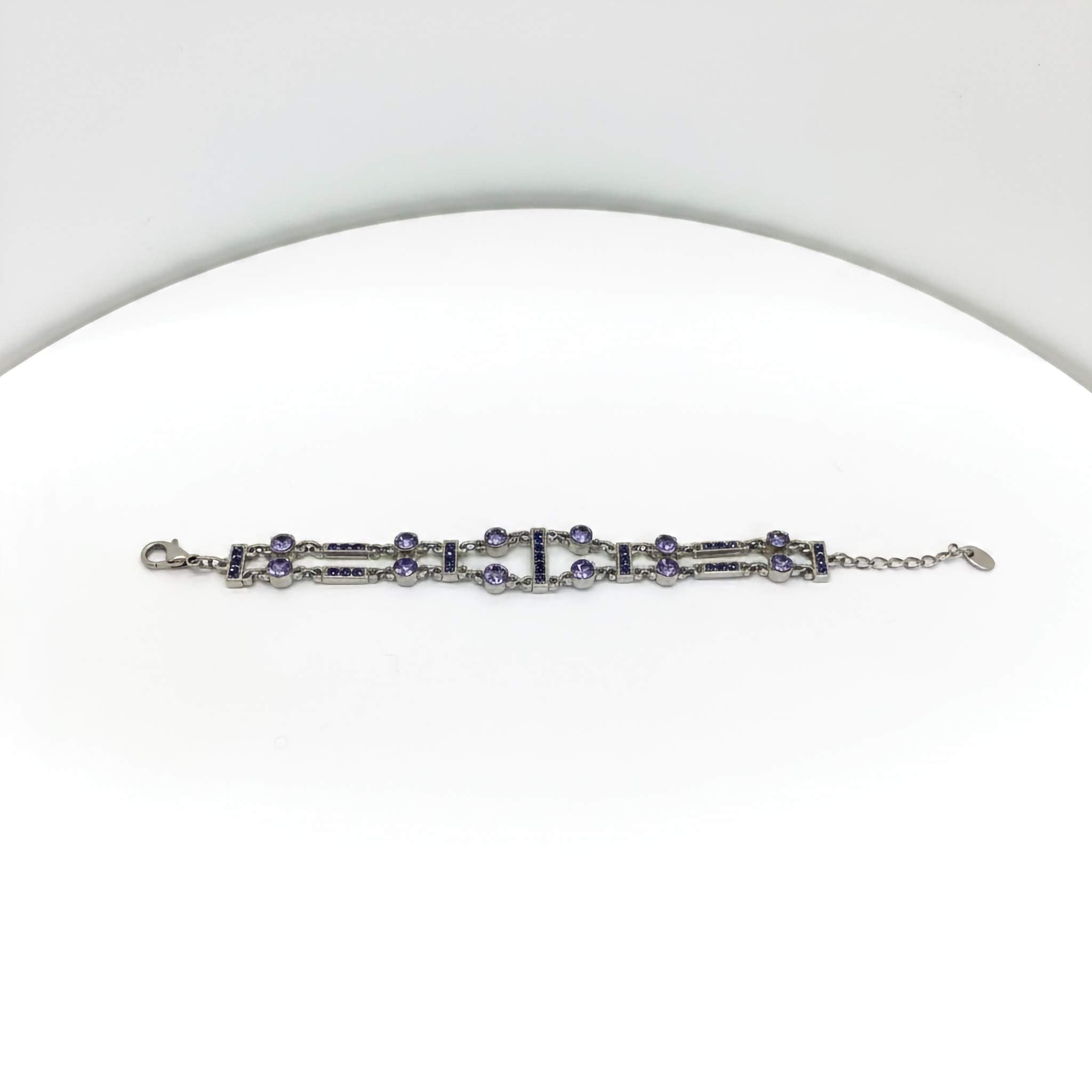 oxidized bracelet with purple stones on a white background