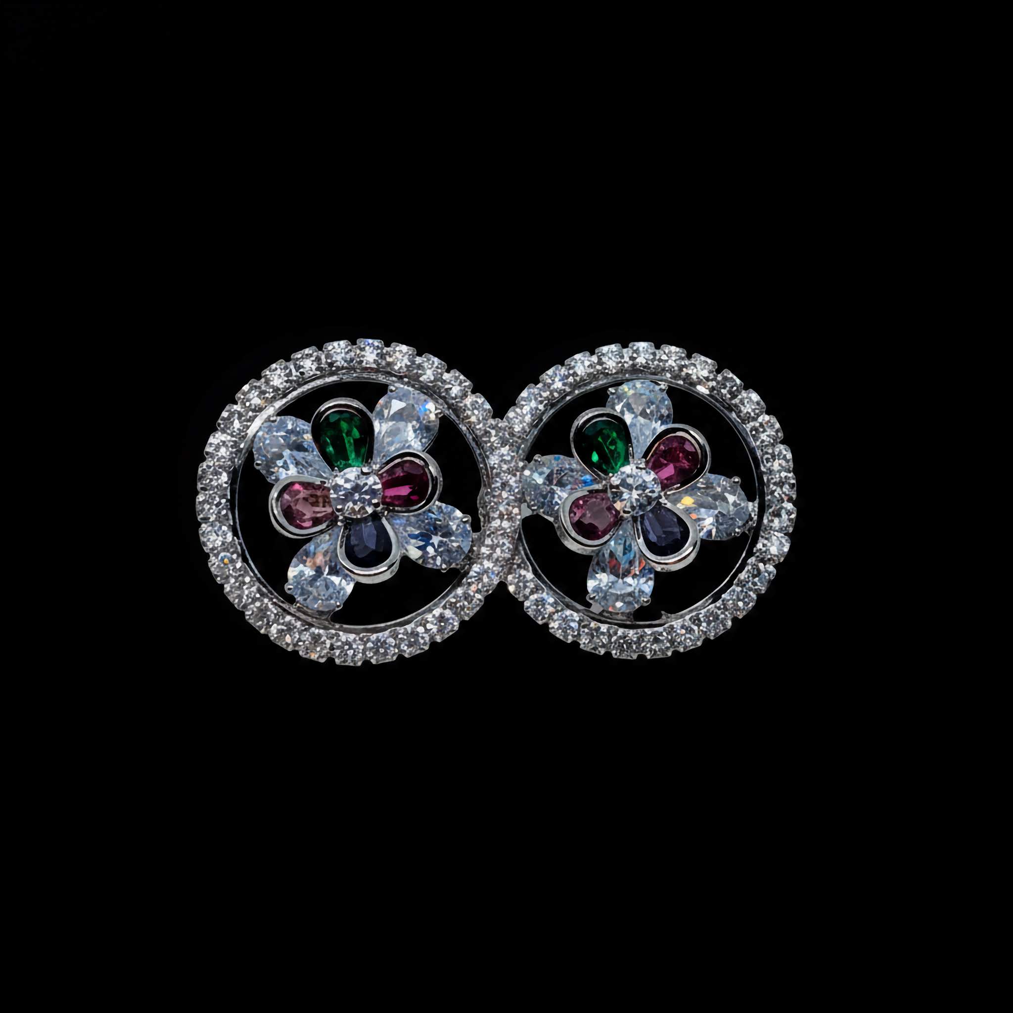 pair of earrings with multi-colour stones on a black background