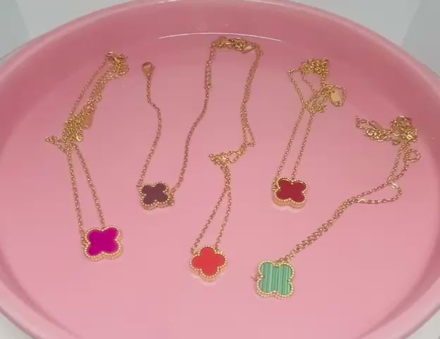 Clover necklaces of various colors video