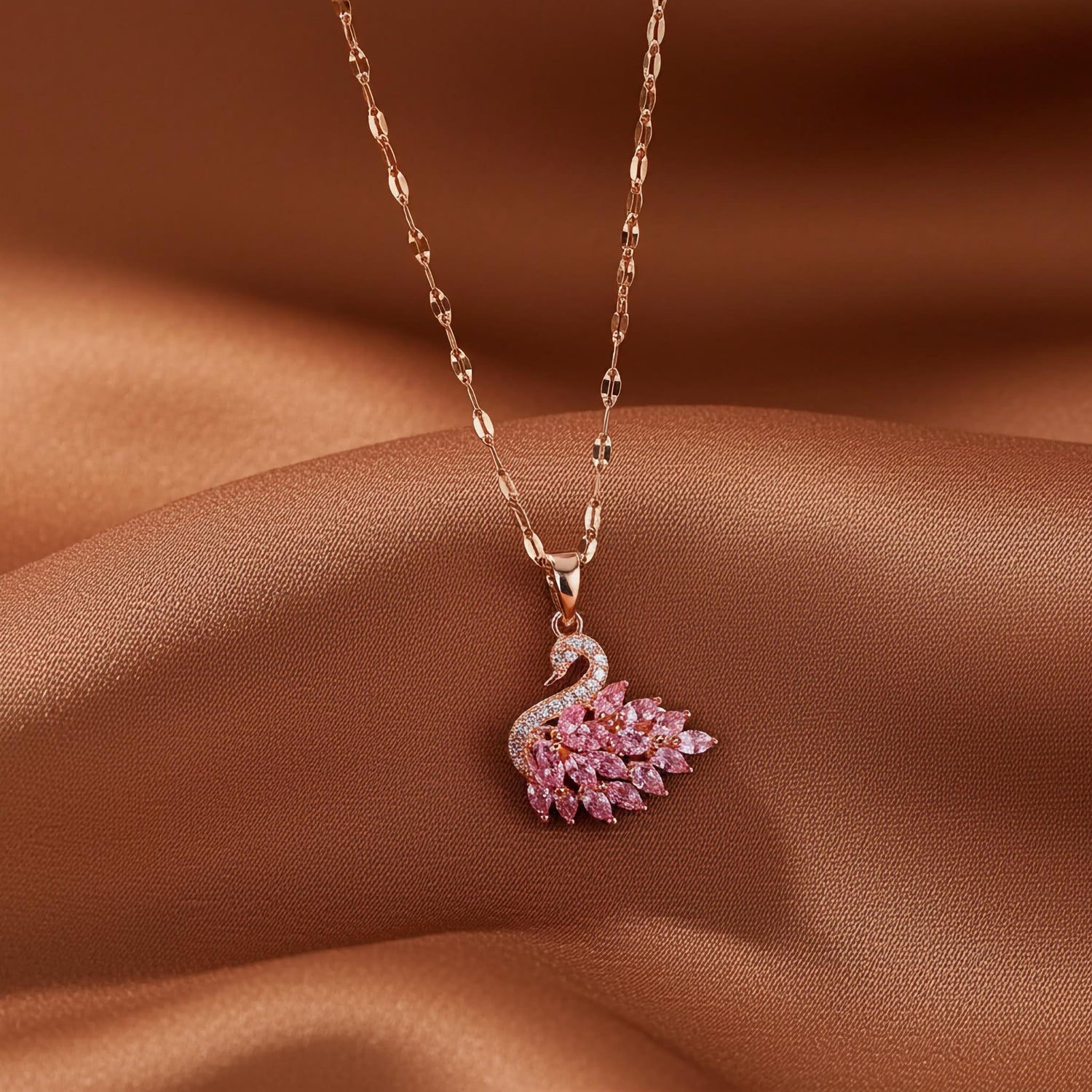 Pink crystal swan pendant with 18k gold chain