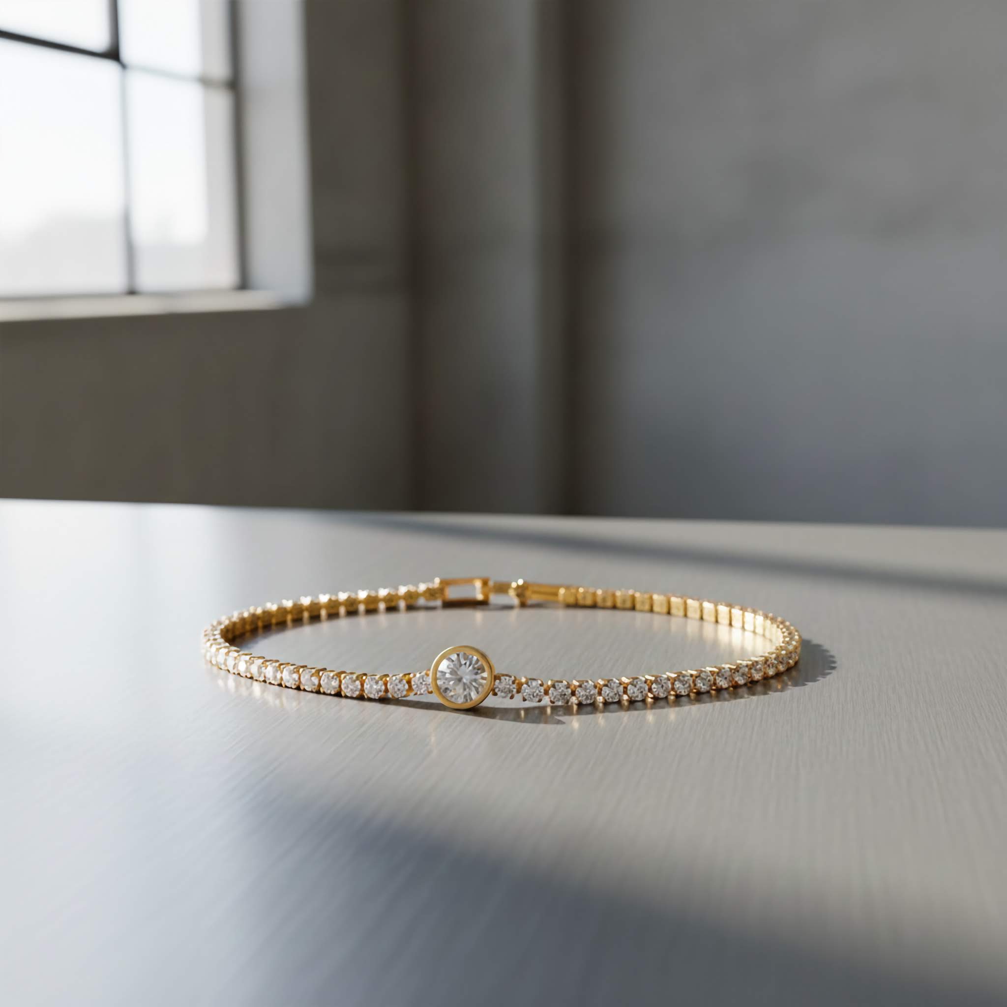18k Gold plated bracelet with a central gemstone on a reflective surface