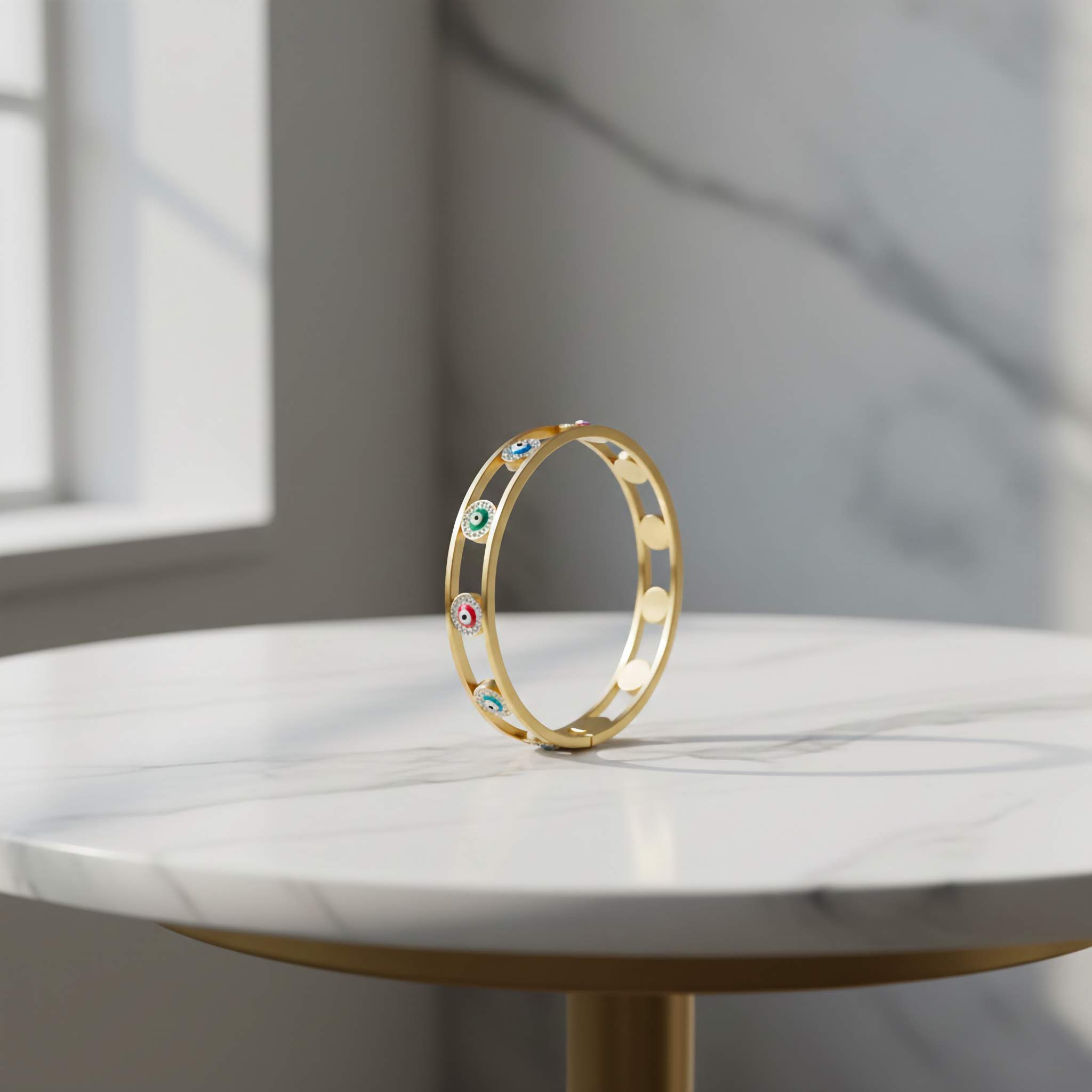 18k gold plated multicoloured evil eye bracelet in stone table background