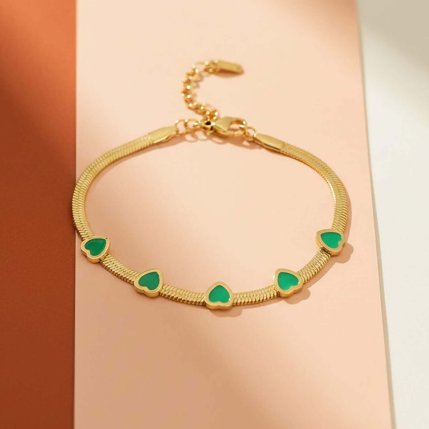 Elegant Green Crystal Bracelet with green gemstones on a gradient background