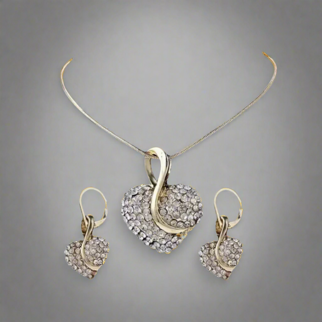 Handcrafted heart shape, gold-tone necklace, earrings, bracelet, and ring