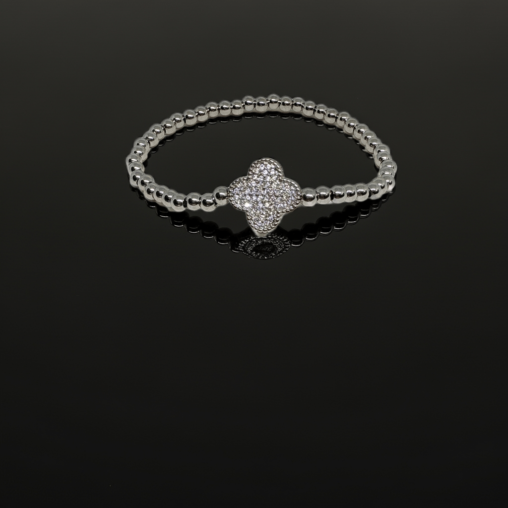 Silver bracelet with a diamond clasp on a black background