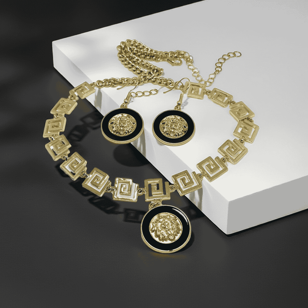 Tiger design necklace with Pendant and earrings. displayed on a white block.  Stainless steel, 18k gold coated displayed on a white top.
