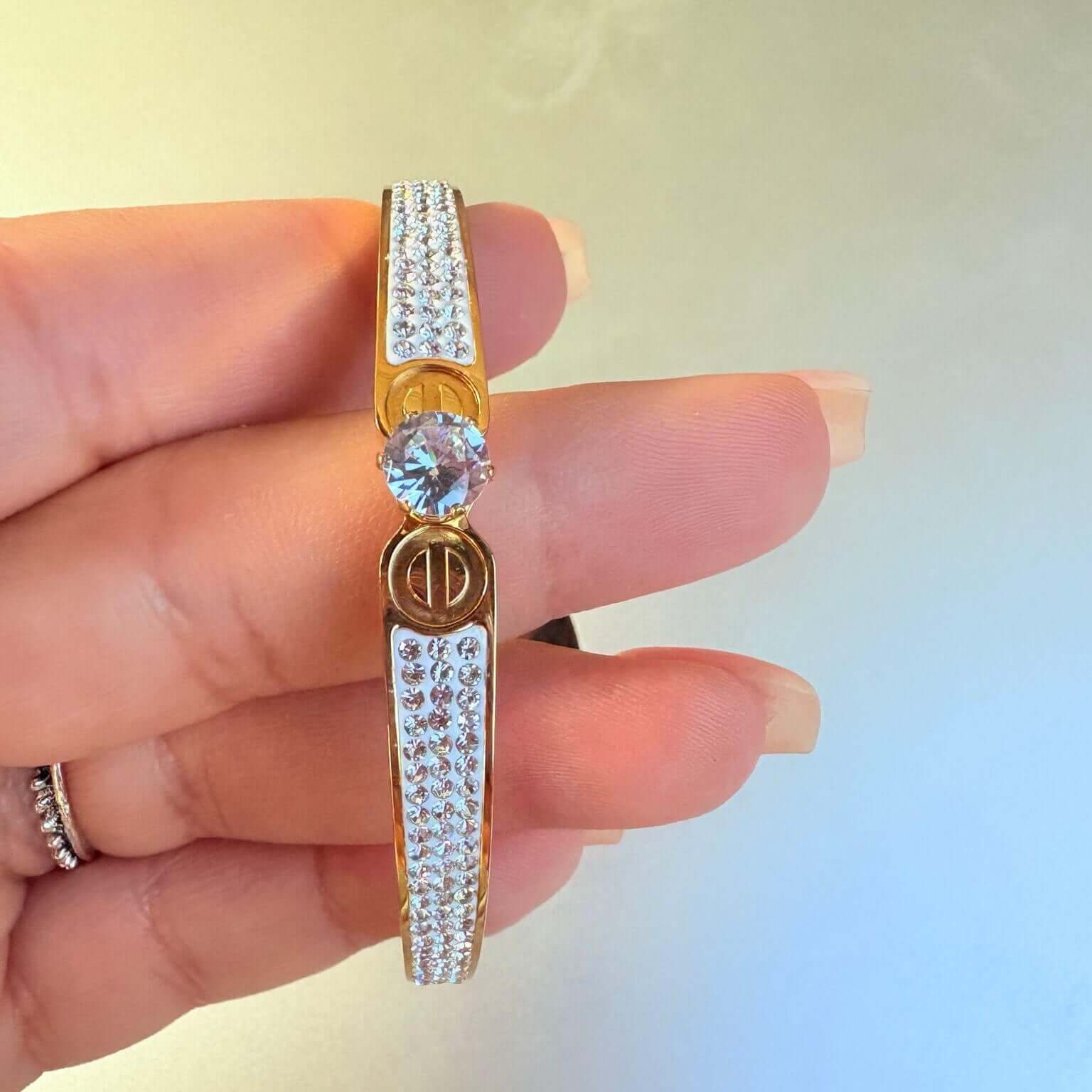Golden plated bangle with white structure