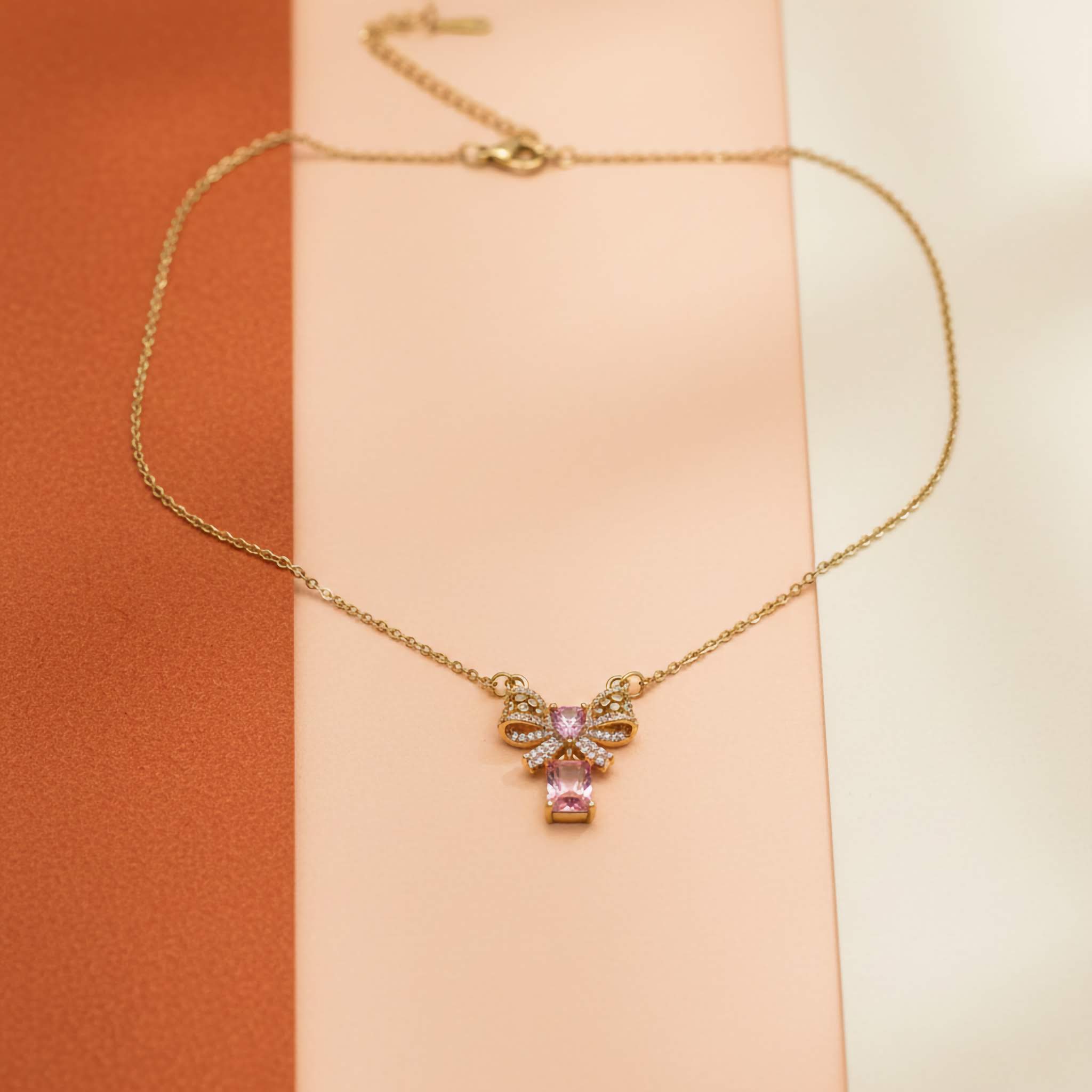 Rosé Bow Charm Necklace