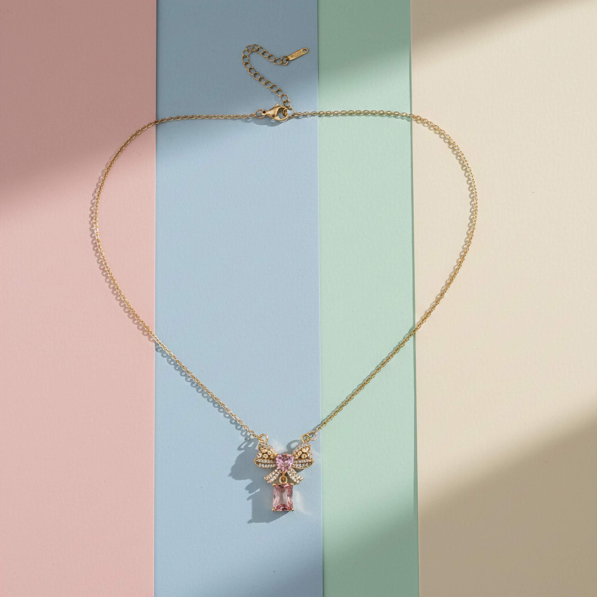 Rosé Bow Charm Necklace