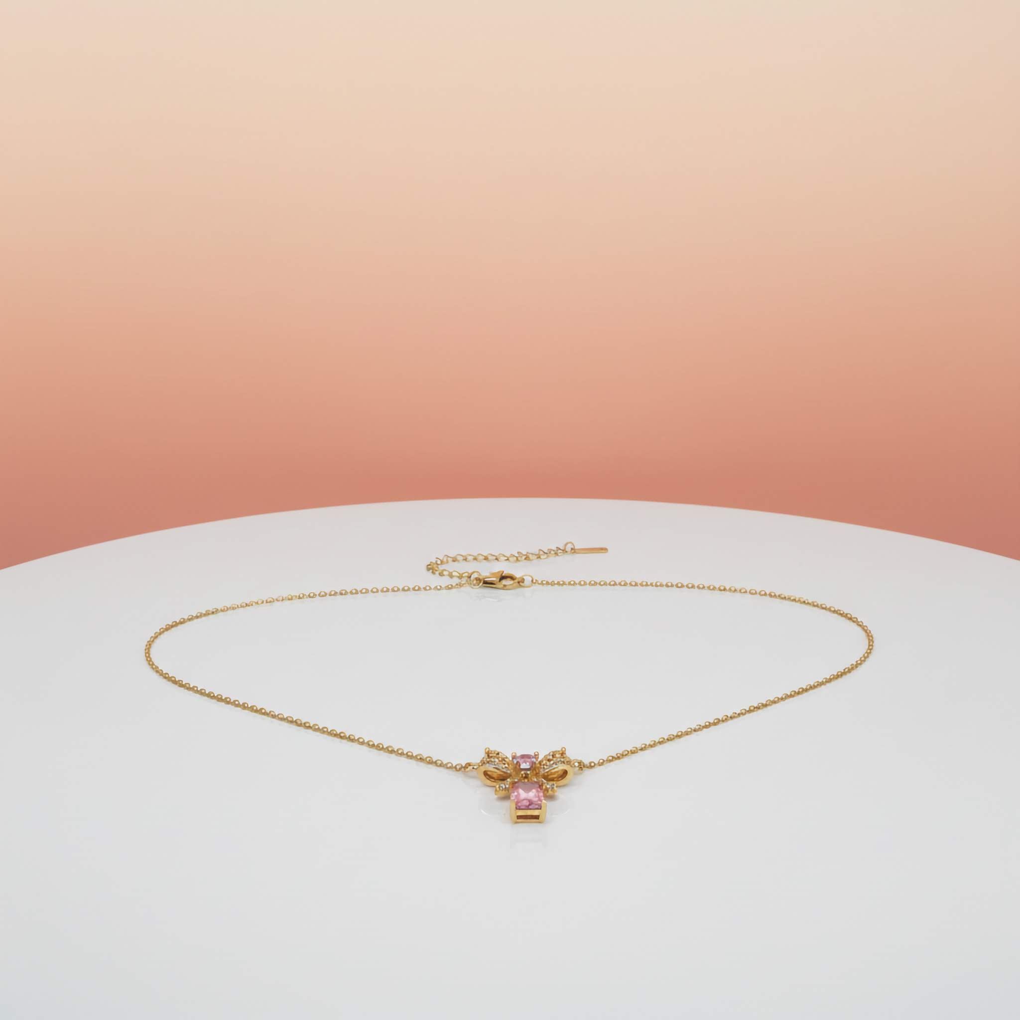 Rosé Bow Charm Necklace