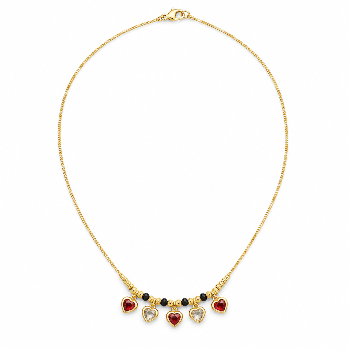 Gold-tone necklace with five alternating red and clear heart charms and black beads on white