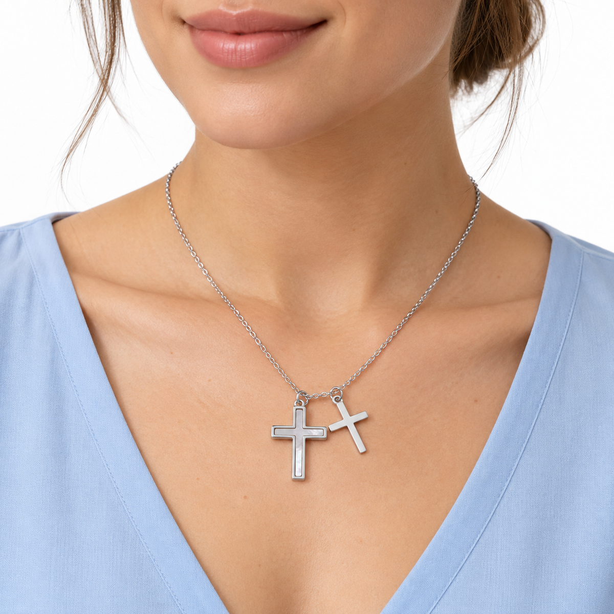Female model wearing LeDeSaRa silver-tone stainless steel double-cross necklace