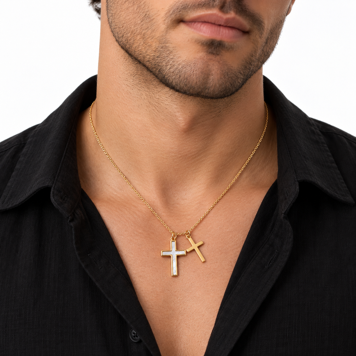Male model wearing LeDeSaRa stainless steel double-cross pendant necklace