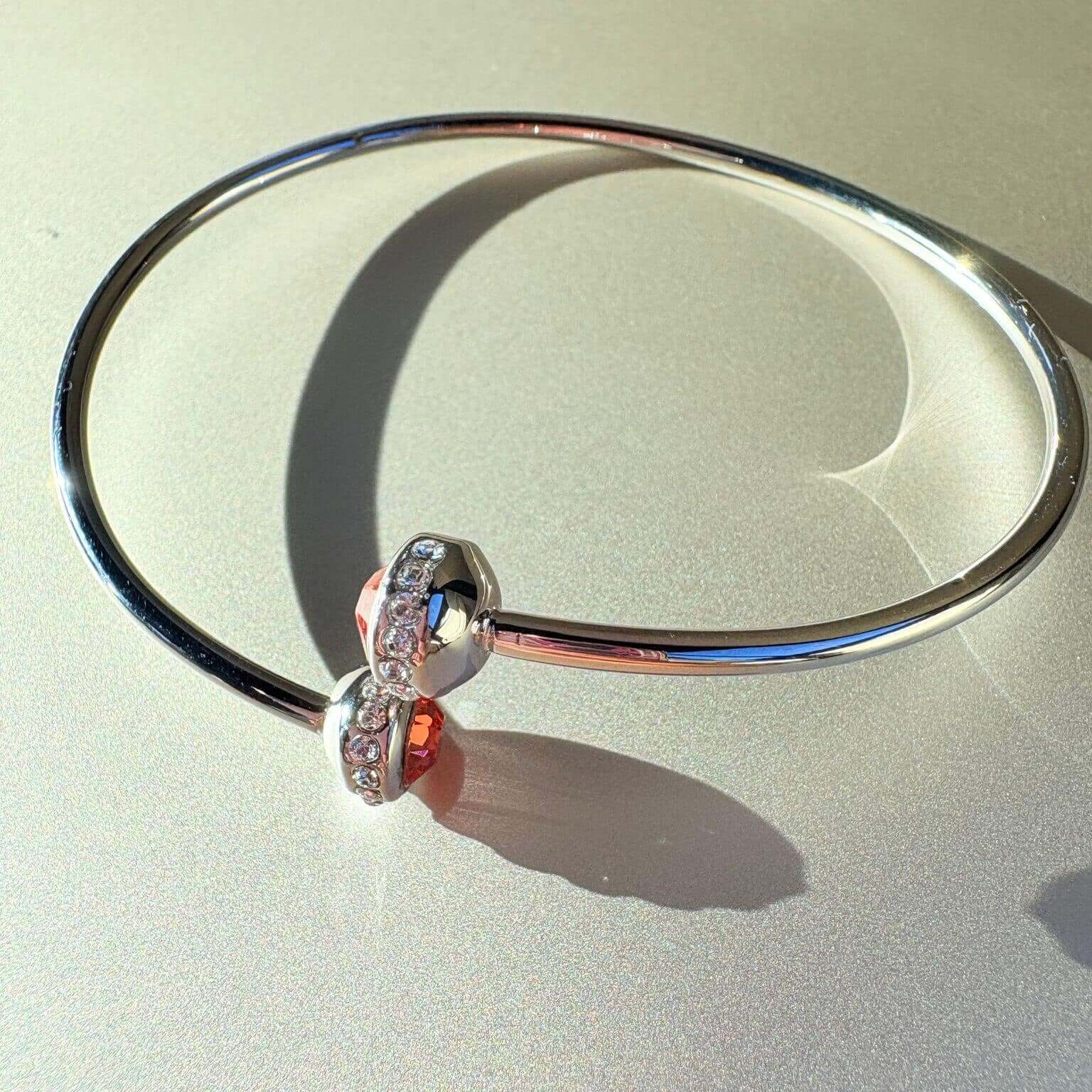 Steel bangle with glass tips